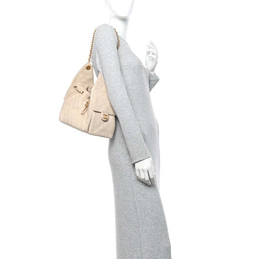 Caviar Quilted Small Chanel 25 Handbag Beige