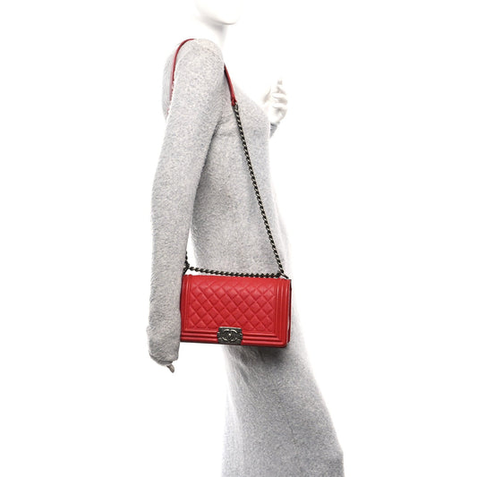 Caviar Quilted Medium Boy Flap Red