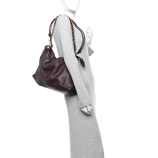 Mellow Nappa Donut Chain Large Flamenco Knot Clutch Dark Burgundy